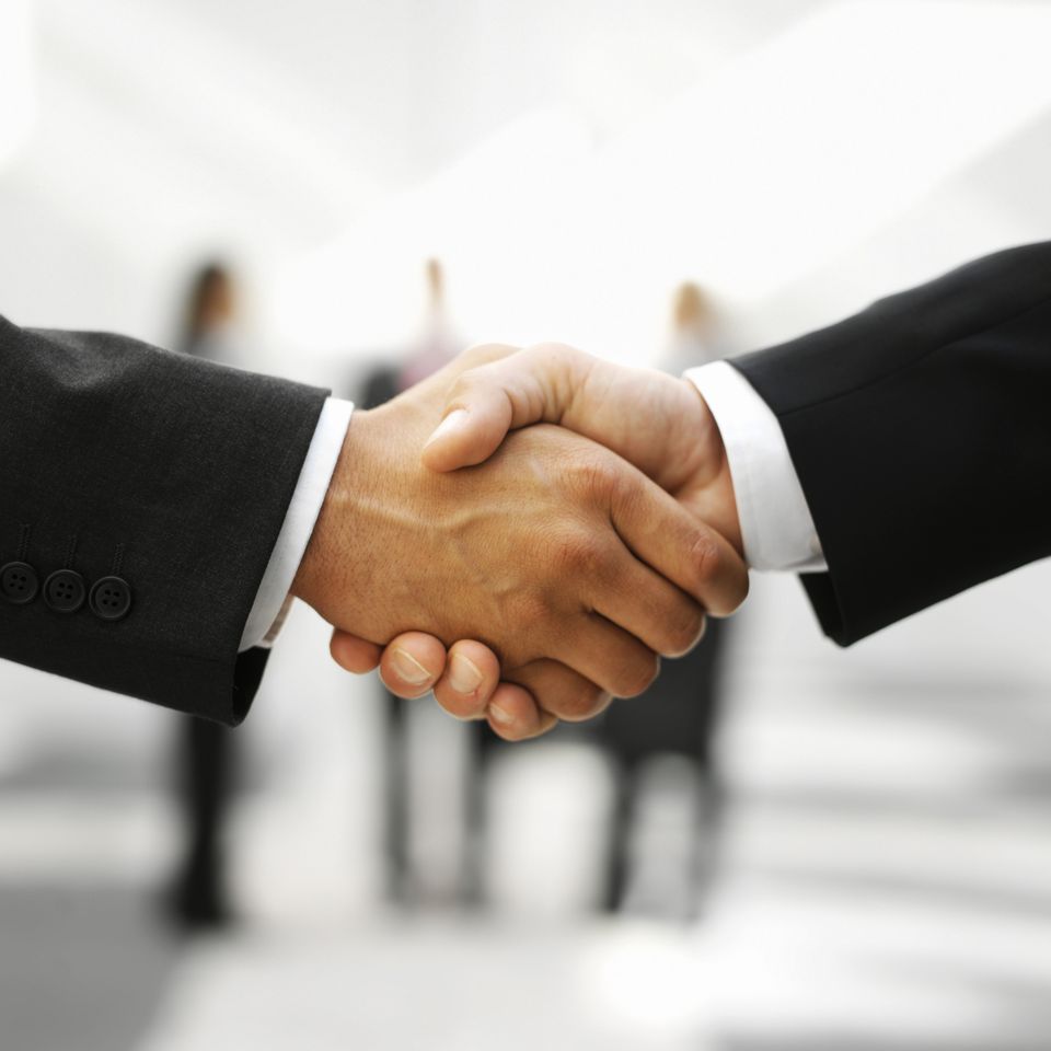 Two people shaking hands